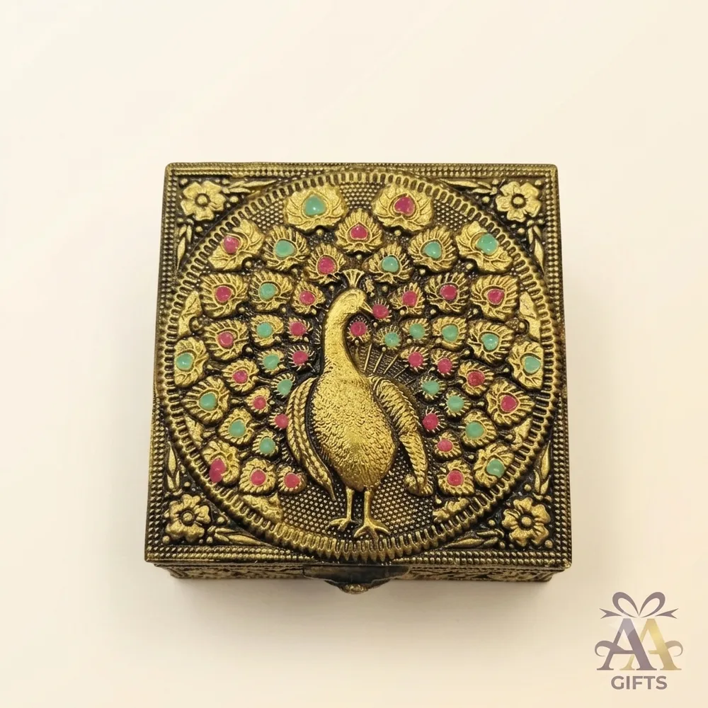 Antique brass square peacock embossed trinket kumkum box with ruby and emerald stones Chennai