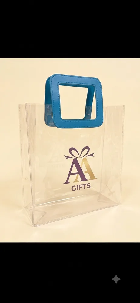 Custom printed clear PVC gift tote bag with blue handle Chennai return gifts