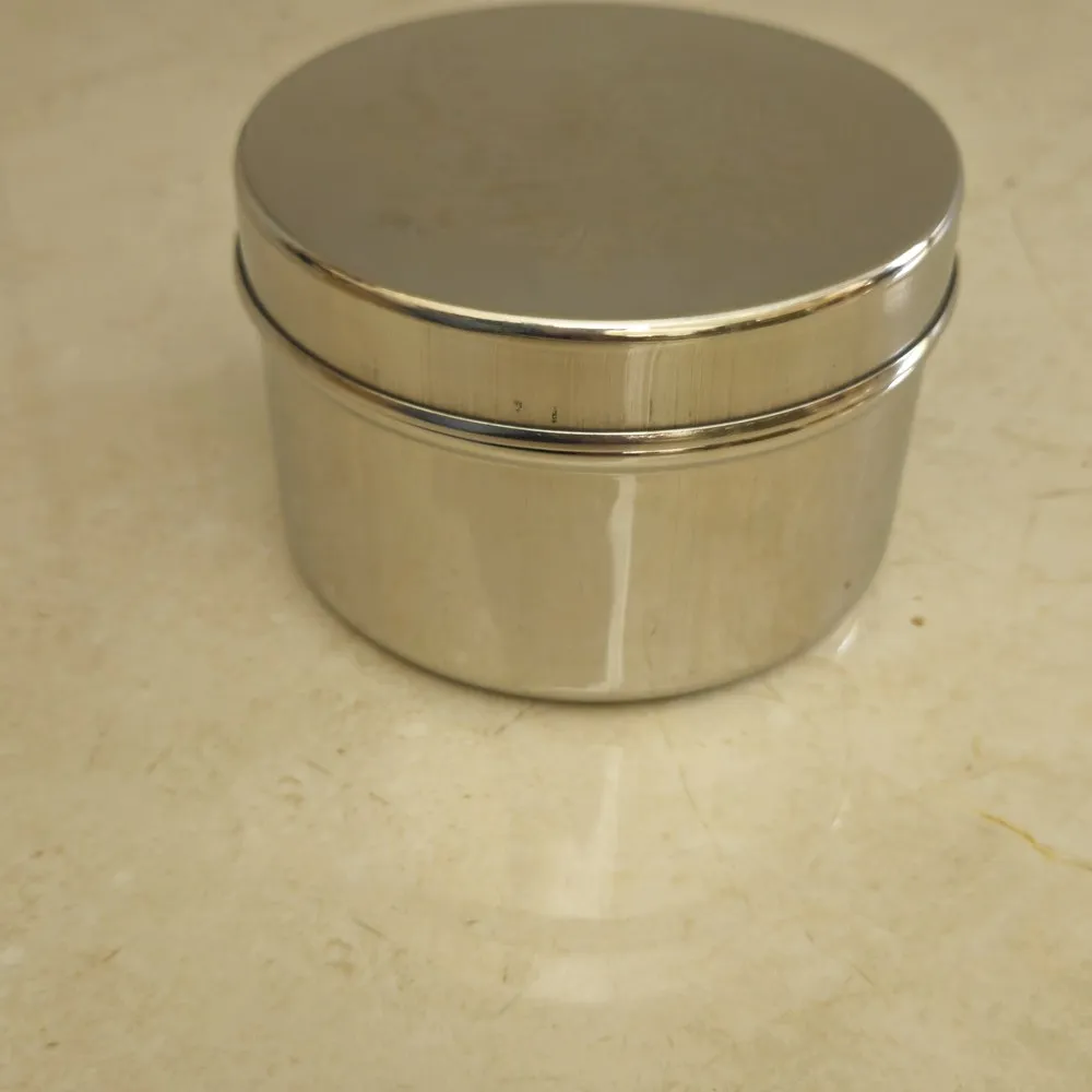 Heritage stainless steel return gift container for wedding and reception guests